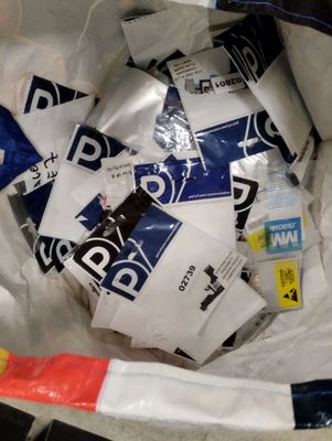 a bag full of stickers and a toothbrush inside of it