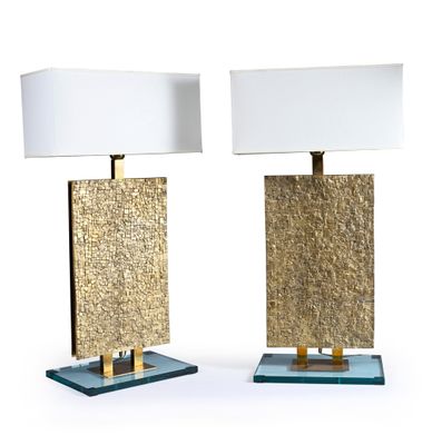 pair of brass and glass table lamps with white lampshads