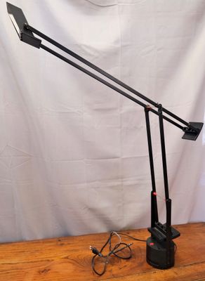 an image of a desk lamp on a wooden table with a white background