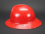 an image of a red hard hat on a black background