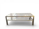 une table basse en verre avec une structure en métal et un plateau en verre