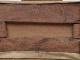 a piece of wood with a piece of paper on it