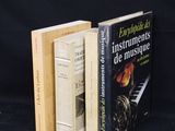 three books that are sitting on top of each other