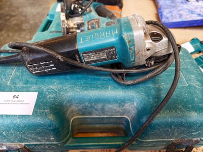 a blue tool case with a corded drill on top of it