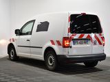 an image of a white van parked in a room
