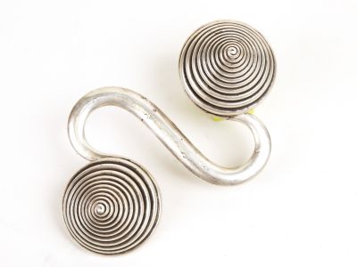 pair of silver spiral earrings on a white background