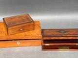 pair of antique wooden boxes with brass inlays on top