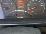 a close up of a car dashboard with a speedometer and gauges