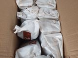 a box full of bags of food sitting on a table