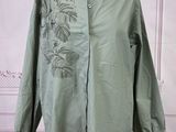 an image of a green shirt on a mannequin mannequin mannequin mannequin mannequin mannequin mannequin mannequin