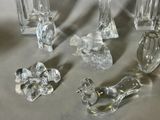 a lot of glass pieces that are on the table