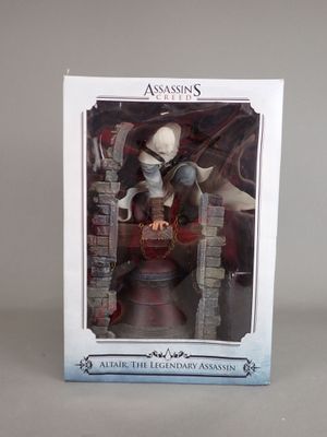 assassin figurine action figure in box on table