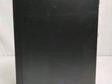 an image of a black box sitting on top of a white surface