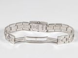 an image of a silver bracelet with a silver clasp on a white surface