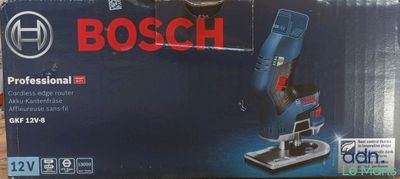 La boîte d'une perceuse sans fil Bosch est ouverte sur la table.