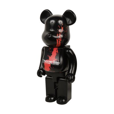 a black bear with blood on it ' s face