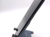a close up of a cell phone on a stand