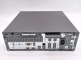 a close up of a computer on a white surface