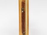 an image of a cigar in a clear box on a white background