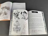 an open book with a drawing of a man and a woman