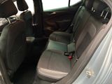 the back seats of a car with a seat belt in the back of it