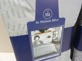 a box with a picture of a bed in it