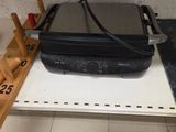 a piece of luggage sitting on a shelf in a room