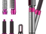 a group of different types of hair brushes and combs on a white background