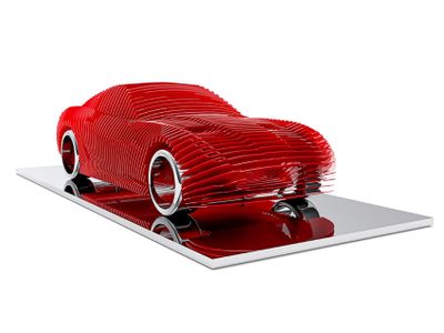 3d printed model of a red sports car on a white surface