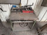 a workbench with tools on it in a garage