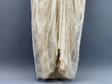 an image of a woman in a white dress