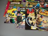 a lot of comic books on the table