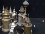 a lot of different types of metal objects on a table