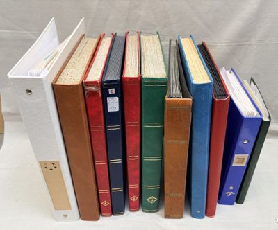 a lot of books that are stacked together on a table