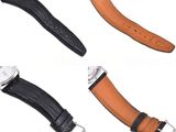 three different styles of watches with black leather straps on a white background