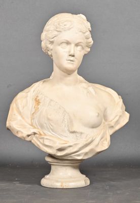 marble bust of a woman with a bust on top of a pedestal