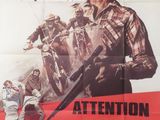 une affiche de film mettant en scène un homme tenant une arme à feu