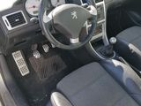 a picture of a car dashboard with a steering wheel
