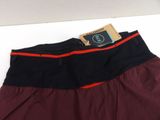 a close up of a pair of shorts with a tag on it