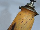 a light that is hanging off of a ceiling