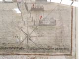 a picture of a map on display in a glass case
