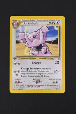 a close up of a pokemon card on a table