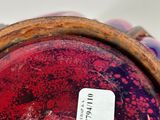 an image of a close up of a vase with a tag on it