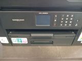 a printer that is sitting on top of a table