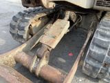 a close up of a tractor with a large tire