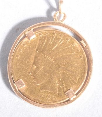 a gold coin in the shape of a sunburst