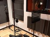 a room with a lot of sound equipment in it