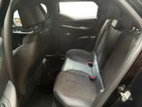 the back seats of a car are empty and the passenger seat is empty