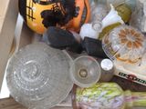 a box full of glass items that are sitting on a table