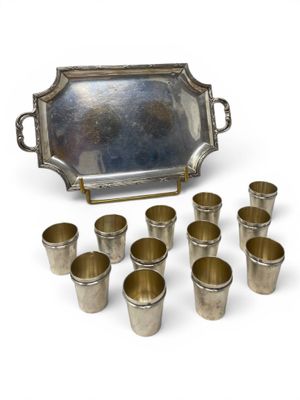 silver plated serving set with six cups and a tray